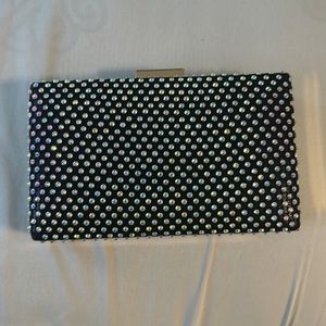 Cute little crossbody purse, never worn, brand new with tags.